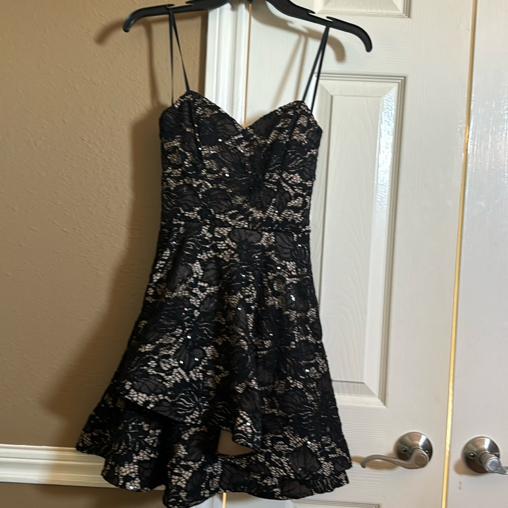 Cocktail dress sparkling. Size 3/4. Gently used. Lined with being materials